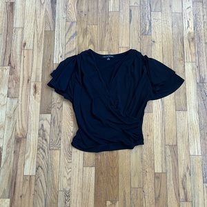 Super cute black blouse.